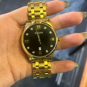 Bulova Black and Gold Diamond Watch